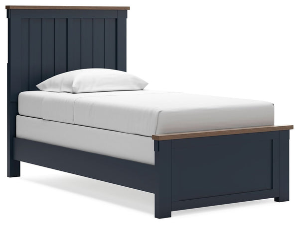 Add homespun charm to your restful retreat. A modern take on a timeless silhouette, this twin panel bed pairs a dark slate blue finish with light brown accents. The slatted headboard in a classic Shaker style brings an air of beautiful simplicity to the b