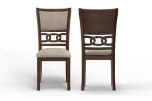Enhance your dining space with this set of two New Classic Gia Wood Dining Chairs in a rich brown cherry finish. Crafted from solid Rubberwood and Mindi veneers, these chairs offer a perfect blend of durability and aesthetic appeal. The brown cherry finis