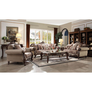 Welcome the essence of lavish living into your home with the Mehadi sofa. Shapely front posts with detailed carving, follow the elegant curve of the rolled arms that make a transition to the wood trimmed arched padded backrest which is silhouetted by a ca