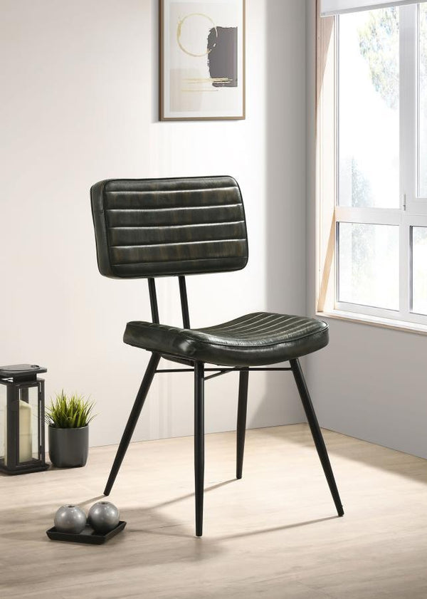  this dining side chair is a striking addition to any dining space. Upholstered in hand-dyed genuine goat leather