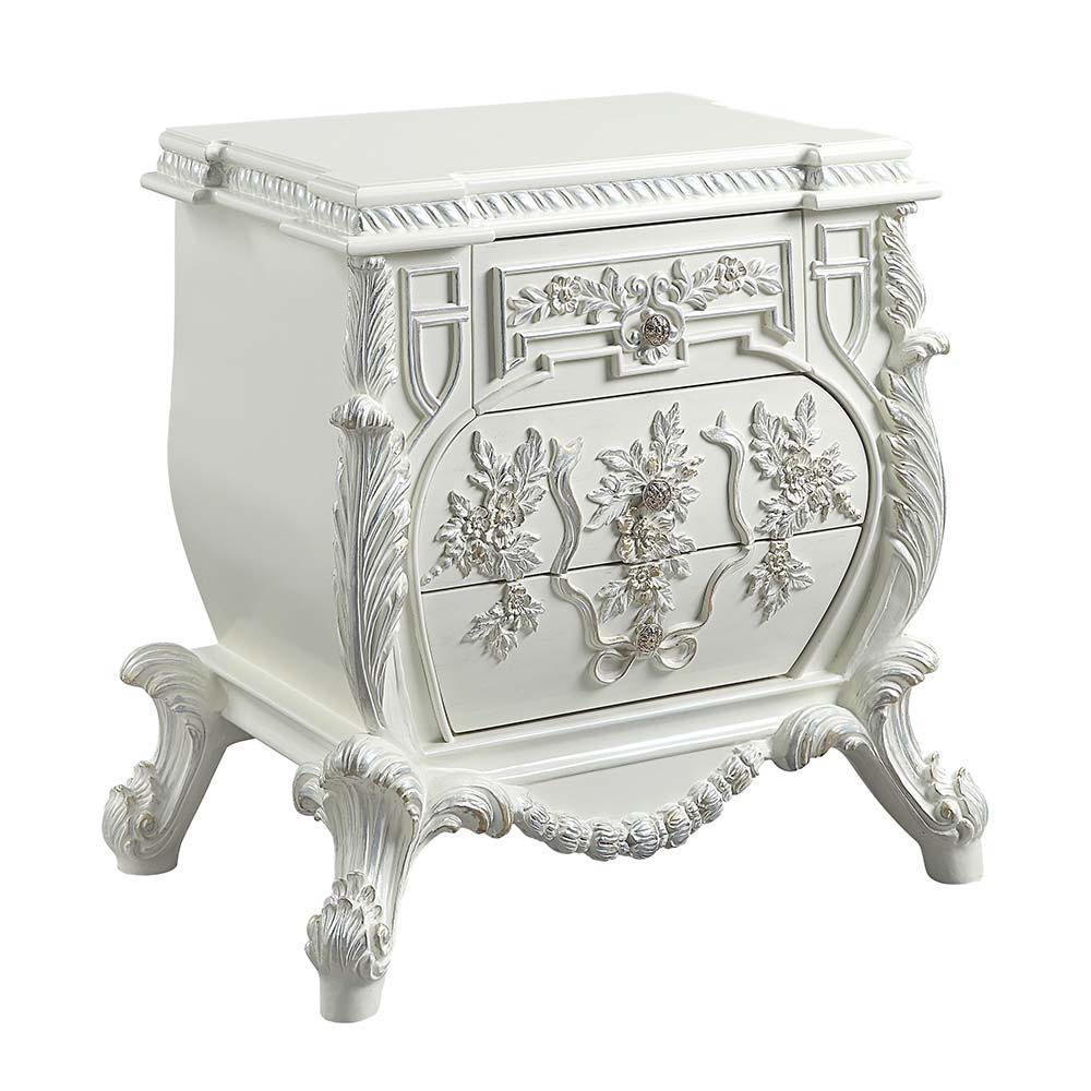Luxurious style, sophisticated charm, and lustrous finishes are all included in the Vanaheim Bedroom Collection. Extravagant scroll floral design with gold trim accent creates classic appeal and timeless silhouettes. Button tufted headboard and footboard 