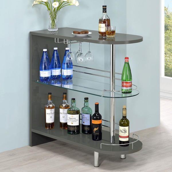  the silhouette is cool and neutral. Tempered glass storage shelves offer a clean and open feel while displaying libation bottles in style. Included gua