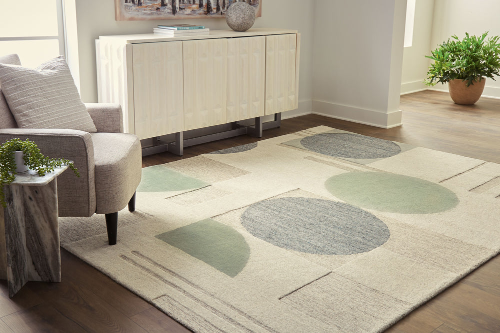 Low-key with high style. This hand-tufted area rug sports casually cool circles, a subtle palette and feel-good design. It-'s a relaxed sensibility that just worksâ€”anywhere and everywhere your floors are in need of a design refresh.<br/><br/><b>Product 
