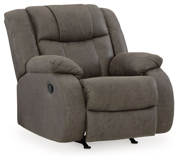 This recliner tees you up to catch up on streaming or enjoy the latest game without breaking the bank. Its easy reclining motion and inviting stitched details craft a stylish seat that keeps you utterly at ease. And with a versatile neutral faux leather, 