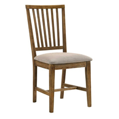 Enhance your dining space with the sophisticated Wallace dining set. This simple table features a weathered finish with the understated styling of transitional design. The sturdy round dining table that features a sophisticated trestle base with a unique 