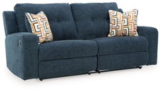 This reclining sofa invites you to a luxuriously soft lounging experience. The chic hue fits right in with contemporary color palettes. A tufted back keeps the look right on trend. Balancing style and function, its pull tab reclining effortlessly takes yo
