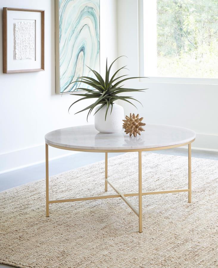 This round coffee table features a genuine white marble top, adding a sophisticated touch to any living room. The elegant marble surface is supported by a welded iron frame with a luxurious gold finish. Fully assembled and ready for use, this cocktail tab