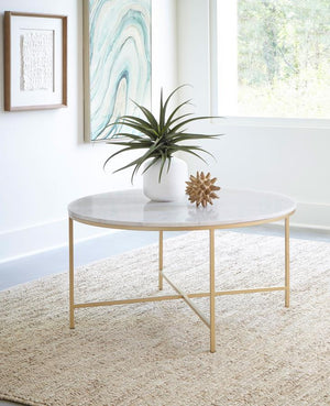  adding a sophisticated touch to any living room. The elegant marble surface is supported by a welded iron frame with a luxurious gold finish. Fully assembled and ready for use