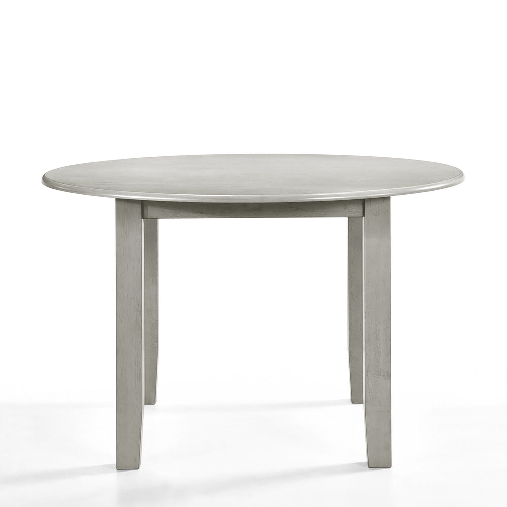Discover the Pascal Wood Round Dining Table in Driftwood Gray, a refined and versatile addition to any dining area. Crafted from a durable combination of solid Rubberwood and manufactured woods, this table promises long-lasting stability and strength. Its