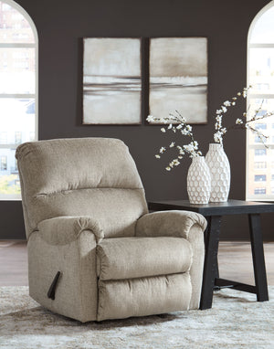  making it a delightful place to unwind. And the seat-'s one-pull reclining adds a layer of surprise. Sink into the plush cushions and treat yourself to 