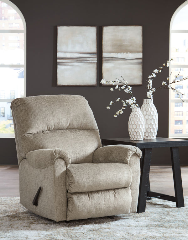  making it a delightful place to unwind. And the seat-'s one-pull reclining adds a layer of surprise. Sink into the plush cushions and treat yourself to 