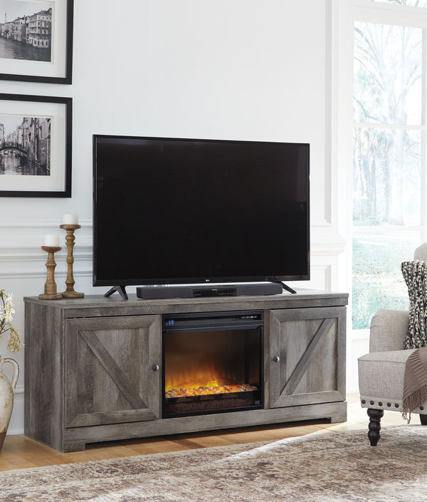 This TV stand with fireplace insert is sure to win your heart with its daring designer take on modern rustic. The standâ€™s crisp, clean and minimalist-chic profile is enriched with a striking replicated oak grain with thick plank styling and a weathered 