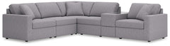 Looking cool and contemporary is great. But when it comes down to it, youâ€™re all about low-maintenance lounging. With the performance fabric on this sectional with console, cleaning spills is a breeze. Its customizable modular design caters to your ever