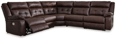 Elevate the everyday with this power reclining sectional. With easy one-touch reclining and spacious seating, the piece offers relaxation and unparalleled coziness. Its faux leather upholstery is comfortably practical and beautifully enhanced with stylish