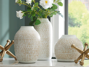  adorned with delicate goldtone accents