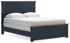 Add homespun charm to your restful retreat. A modern take on a timeless silhouette, this queen panel bed pairs a dark slate blue finish with light brown accents. The slatted headboard in a classic Shaker style brings an air of beautiful simplicity to the 