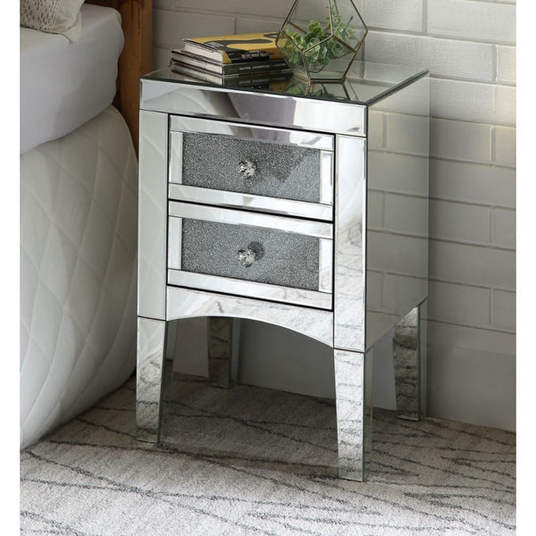 Assembled, Rectangular Night Table Storage: 2 Drw Features: Mirrored Finish, Front Drawer w/w/Faux Crystals & Clear Glass, Mirrored Tapered Leg (Open Base) CONSTRUCTION Mirrored Case Frame: 4mm Beveled Mirror, MDF