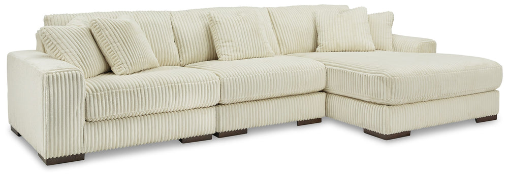 Plush and posh. Showcase your eye for on-trend texture with the statement-making cord upholstery of this sectional with chaise. Its stunningly soft fabric entices in an ivory hue, complementing contemporary color palettes. Sink into the cushions and plan 