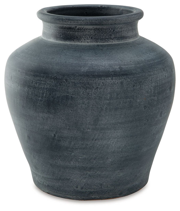 Understated in its beauty, this vase offers a traditional feel courtesy of its terra cotta construction. The antiqued look is brought into the present with a distressed blue hue. It-'s an effortless way to elevate a centerpiece, bookshelf or mantle. Add f