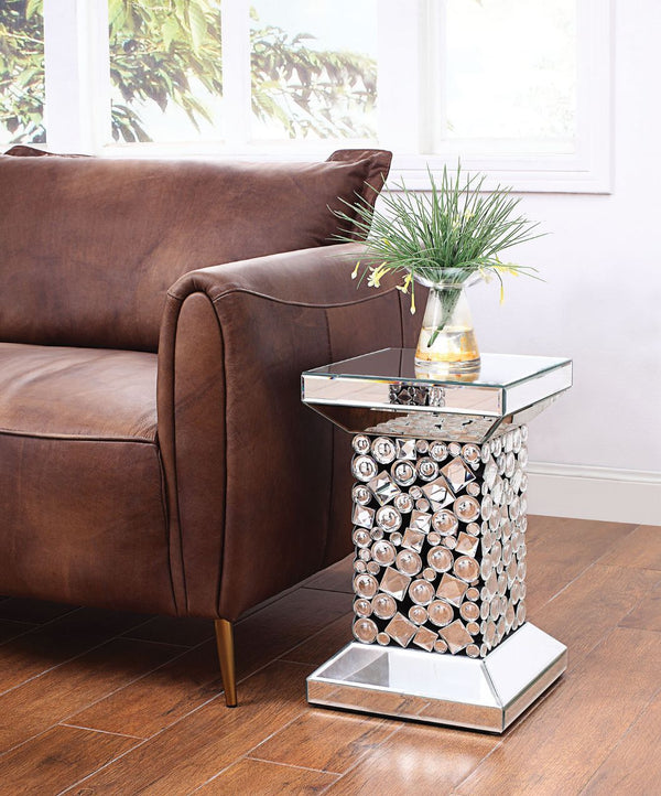 The Kachina End Table will add a contemporary touch to any room in your home. With its clean lines, this brilliant square occasional table showcases a distinctive style for an intriguing look. The table features a fully mirrored beveled frame with mirror 