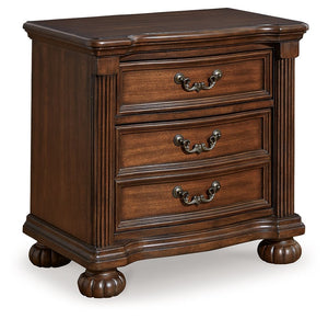 Take inspiration from the traditional luxury of this nightstand. Classic with a rich cherry brown finish, its stately presence graces your room with an air of opulence. Your taste for exquisite details is satisfied with decorative drawer pulls and chic bu