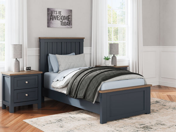  this twin panel bed pairs a dark slate blue finish with light brown accents. The slatted headboard in a classic Shaker style brings an air of beautiful simplicity to the b