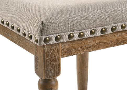 Convey a casual style in a dining room with natural textures and classic elements. All crafted with wood, this design incorporates a rural, comfortable traditional feeling. Wooden trestle base with turned legs anchors the chair with a timeless style. The 