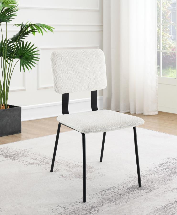 Reimagine your comfortable and inviting dining table with a set of two modern side chairs. Each features an armless profile with clean, slim lines for a versatile design. Sure to complement in a variety of settings, the chairs feature slim cushions with n