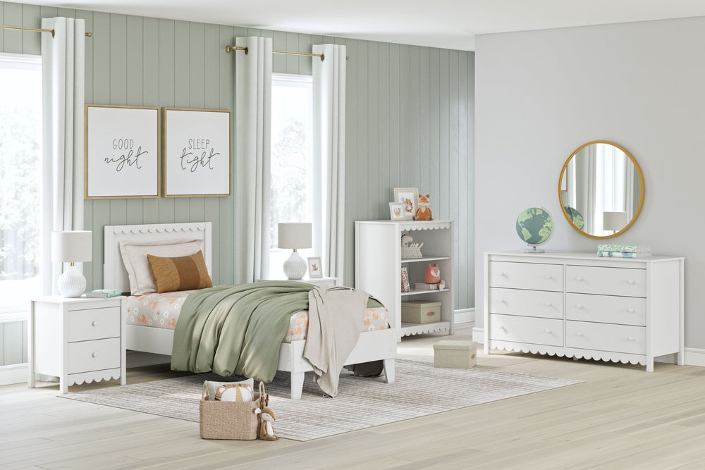 Thanks to its playful scallop design, this bedroom package is the perfect fit for cottage or coastal farmhouse interiors. Its matte white finish serves as the perfect backdrop to showcase your personal taste and creativity. Plus the low-profile bed frame 