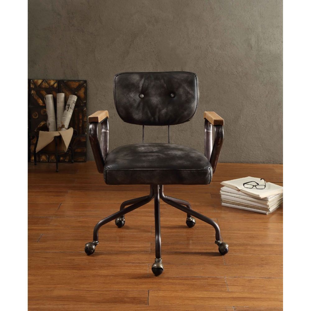 Our durable Hallie office chair gets its industrial look from oversized button tufted back and vintage top grain leather. The 5-star swivel base fitted with casters, it keeps you moving from one task to the next. Some Assembly Required.<br/><br/><b>Produc