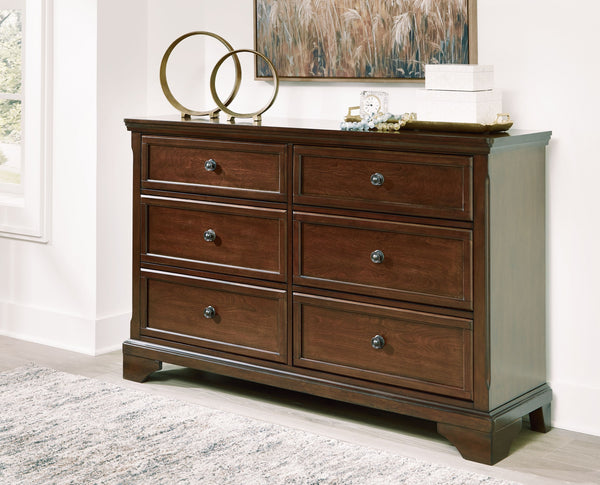  while its functionalism is equally impressive. There is lots of room for clothes and other essentials in six drawers with a warm brown cherry finish. Creat