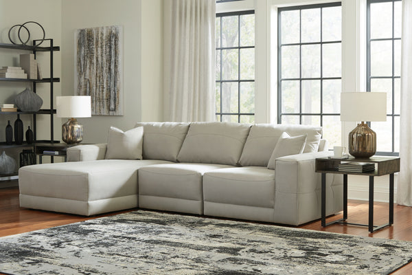 The expansive silhouette of this sectional invites you to spread out and relax. Upholstered in a durable gray faux leather that captures the look and feel of nubuck leather, this stunning piece envelops you in baby-soft comfort. Its clean modern aesthetic