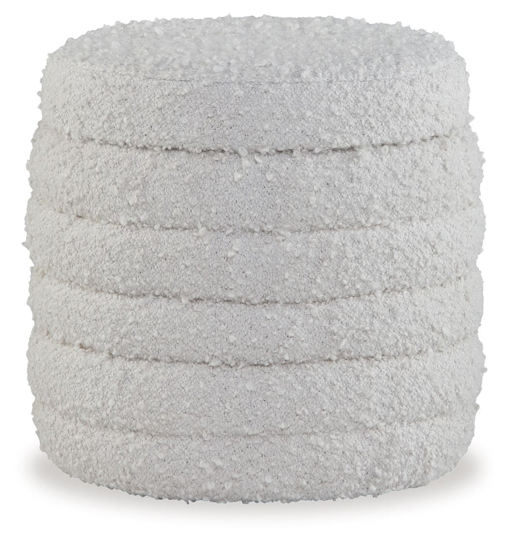 Who says comfort and contemporary style can-'t go hand in hand? This ottoman with storage entices with an inviting softness. Storage beneath the top merges forward-thinking function with a modern vibe. What a great place to kick back and unwind.<br><br><b