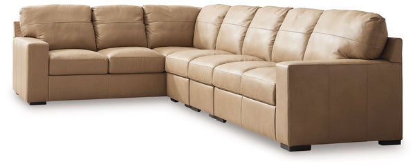 Indulge in attainable, top-of-the-line luxury. With this sectional, you can outfit your home in ultra-sleek style. Genuine leather upholstery on the interior provides the richly refined look and feel you love without breaking the bank. Clean-lined arms po