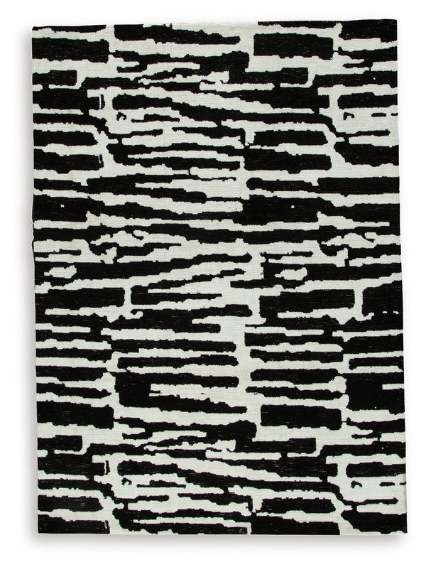 Revitalize your decor with this captivating rug. Infusing your surroundings with style, its abstract motif and rich neutral colors create the perfect pop of interest.<br/><br/><b>Product Features</b><ul><li>Made of polyester</li><li>Machine woven</li><li>