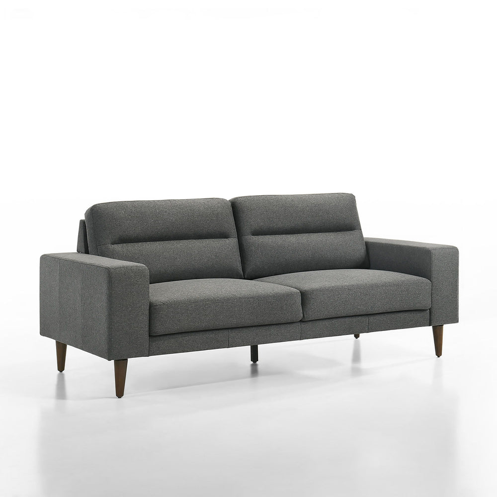 Meet the Vale 3-Seater Couch in Gray, a timeless blend of durability and comfort. Crafted with solid and manufactured wood frames reinforced with corner blocks, this couch ensures long-term reliability. Its cozy 100% polyester gray upholstery is both styl
