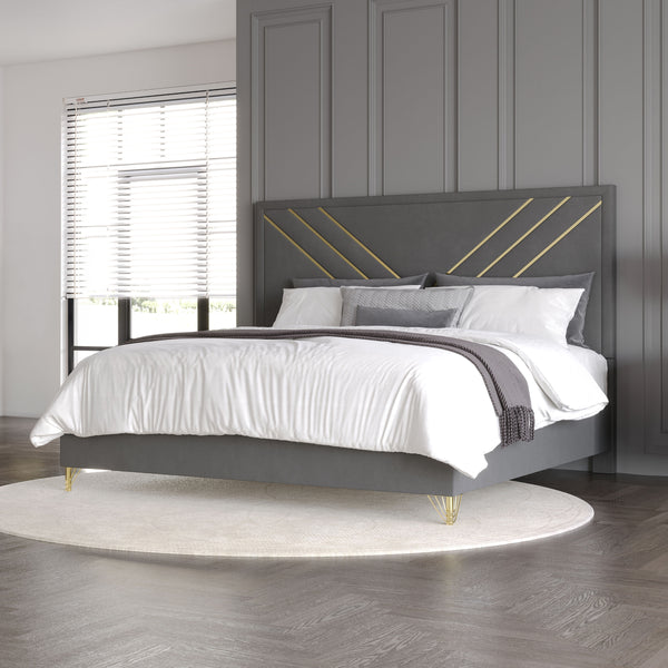 Experience luxury with the Symmetry Upholstered Panel Bed in Gray. Crafted from premium woods with a gray marble laminate, it radiates timeless elegance. Gold metal and mylar accents shine against ultra-soft gray fabric, while intricate detailing adds sop