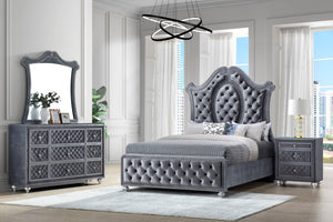 Indulge in the opulence and luxury of this exquisite bedroom collection, where classic glamour meets contemporary design. The grandeur of the tufted, upholstered headboard is framed by an elegantly sculpted silhouette, complemented by the plush finish tha