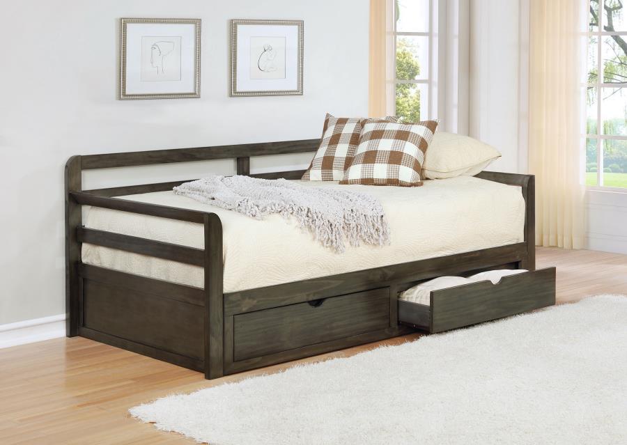 Bring function and fashion to your sleep space with this wood storage sleeper daybed. It is fashioned with pine, plywood, and MDF and is mattress-ready (no foundation required). Bed showcases storage footboard with two built-in drawers for linens and othe