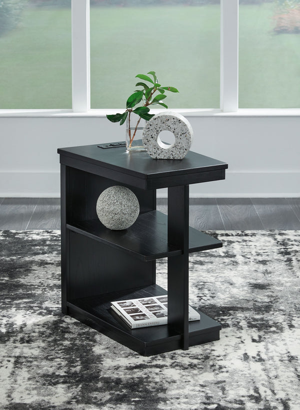  this chairside end table is the perfect choice. Its black finish