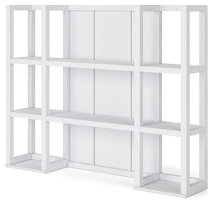  framed photos and plants on the open storage s