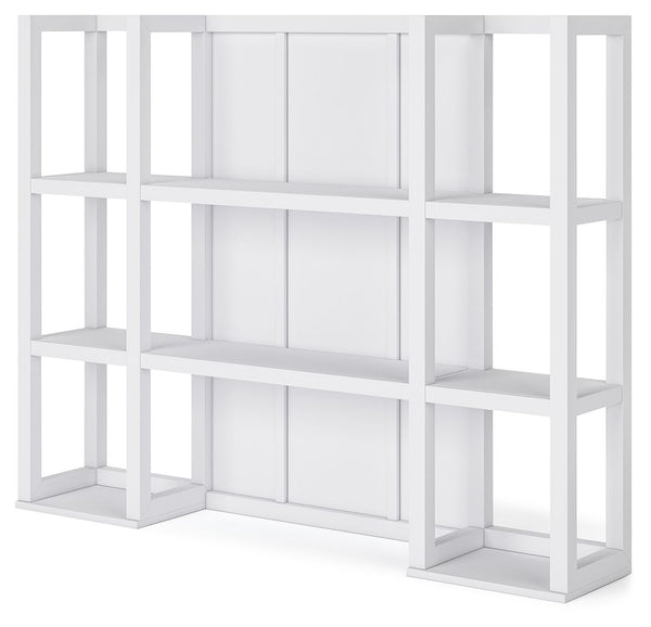  framed photos and plants on the open storage s