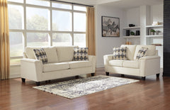 Everyone can have the best seat in the house with this sofa and loveseat. An indulgent choice with deep seats crafted for cloud-like softness, this set is the ideal merger of modern flair and classic staying power. <h4><b>Abinger - Natural - Sofa</b></h4>