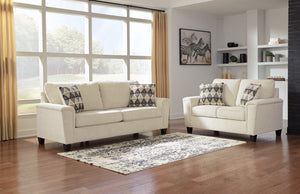 Everyone can have the best seat in the house with this sofa and loveseat. An indulgent choice with deep seats crafted for cloud-like softness, this set is the ideal merger of modern flair and classic staying power. <h4><b>Abinger - Natural - Sofa</b></h4>