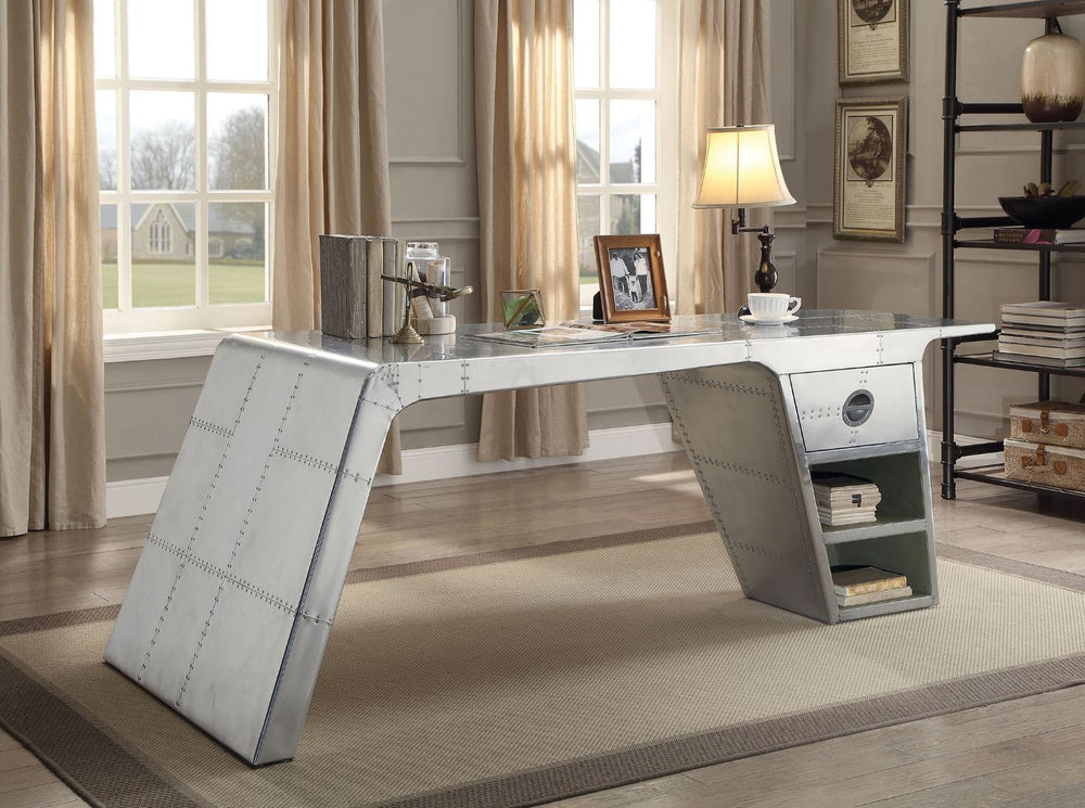 The Brancaster home office collection offers modern look and industrial styling that will be the perfect addition for your workstation. The desk features patchwork of aluminum accented with drawer and shelves for extra storage. Matching the desk with top 