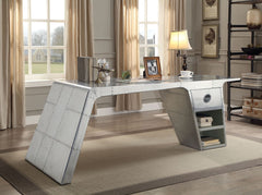 The Brancaster home office collection offers modern look and industrial styling that will be the perfect addition for your workstation. The desk features patchwork of aluminum accented with drawer and shelves for extra storage. Matching the desk with top 