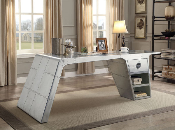 The Brancaster home office collection offers modern look and industrial styling that will be the perfect addition for your workstation. The desk features patchwork of aluminum accented with drawer and shelves for extra storage. Matching the desk with top 