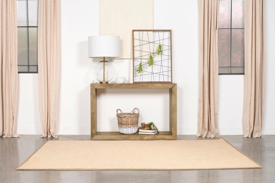 Embracing the very soul of natural design principles, add functional elegance to your space with this console table, crafted from solid mango wood. The natural finish emphasizes the unique wood grain patterns, offering a warm and organic aesthetic. Its re