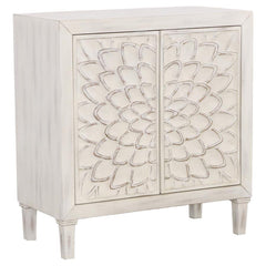 Bring charm and character to your space with this beautifully crafted accent cabinet. Featuring intricately carved floral doors and a distressed white finish, this piece delivers a perfect blend of rustic farmhouse and timeless elegance. Inside, a spaciou