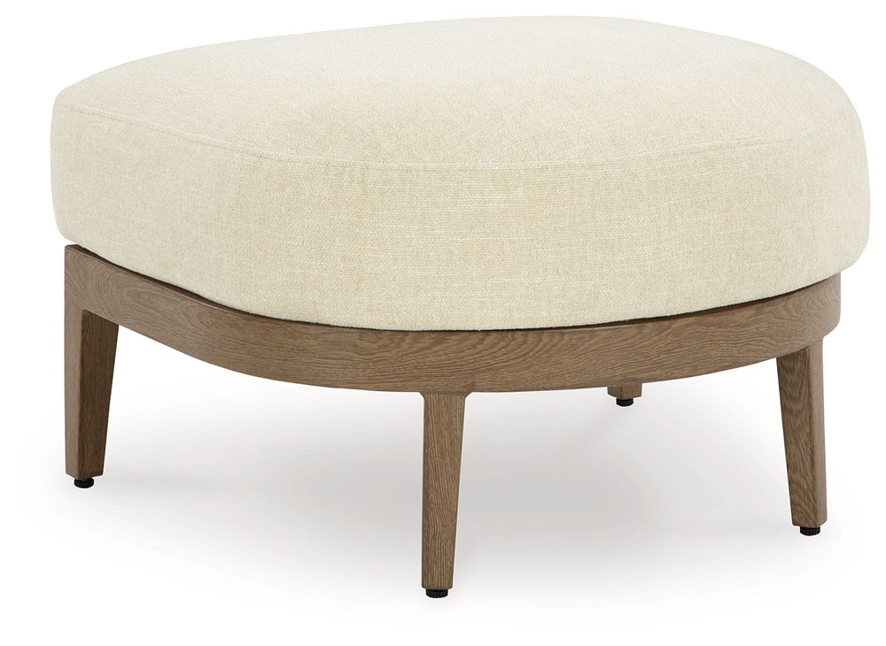 Elevate the appeal of easy-breezy living with this outdoor ottoman. Made to look like wood yet durable enough to weather the elements, it-'s sure to serve you and your besties well, year after year. The gentle curve of the frame is echoed in the cushion, 